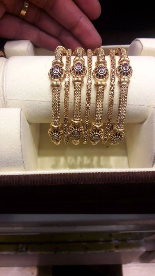 "Antique Gold Bangles Set – Ruby Emerald Touch"